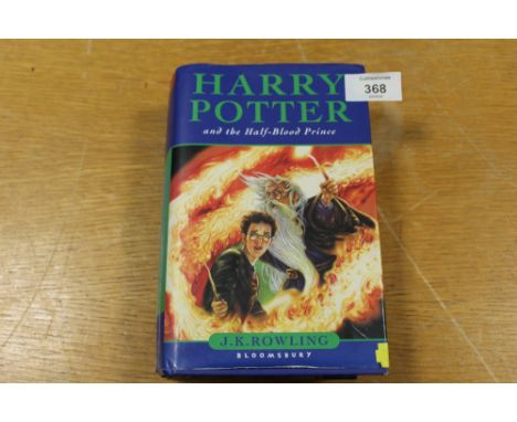 A FIRST EDITION 'HARRY POTTER AND THE HALF-BLOOD PRINCE' BOOK, WITH PAGE 99 MISPRINTED WITH 'ELEVEN OWLS', LATER CORRECTED TO