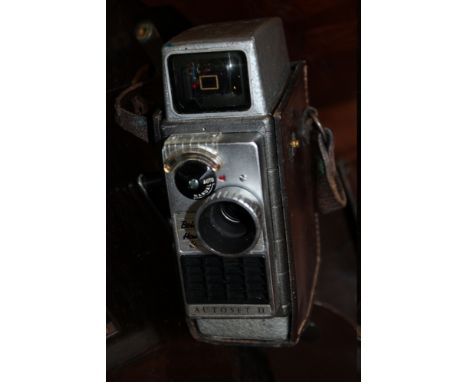 A LEATHER CASED BELL AND HOWELL AUTOSET 2 CAMERA