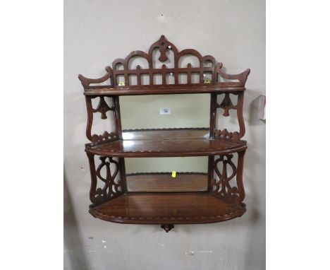 A SMALL AND FINE MIRRORED HANGING SHELF H-83 W-54 CM