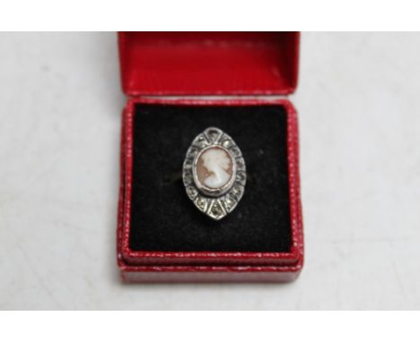 A 9CT &amp; SILVER MARCASITE SET CAMEO RING 