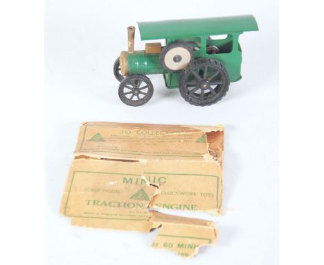 MINIC BOXED CLOCKWORK TRACTION ENGINE green with black moulded plastic wheels, good, remnants of printed straw coloured box (