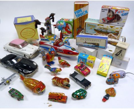 Thirty one mostly made in China tinplate clockwork toys, some in boxes, also a die-cast Made in Western Germany Micro Racer 1