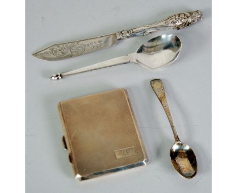 An engine turned cigarette case, an Arts and Crafts sliver 'Apostle' type spoon with baluster finial, an odd silver teaspoon,