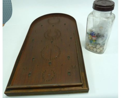 A HOLEY BOGEY CORINTHIAN BAGATELLE BOARD, together with a COLLECTION OF NINETEENTH AND TWENTIETH CENTURY MARBLES, some clear 