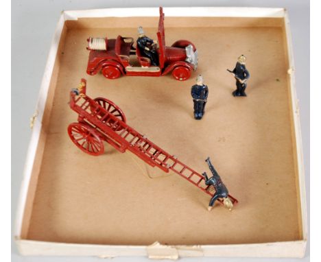 ENGLISH CRUDELY DIE CAST MODEL OF A VINTAGE FIRE ENGINE AND DRIVER, with removable tall windshield to support ladders (absent