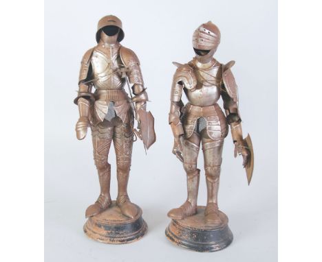 TWO LATE 19th CENTURY STEEL MINIATURE SUITS OF FULL ARMOUR, one having close helmet, each with loose fitting gauntlets, small
