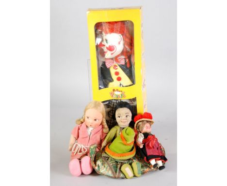 NORAH WELLINGS HANDKERCHIEF DOLL, with moulded painted face and cloth body, wearing green patterned silk skirt tied to hold h