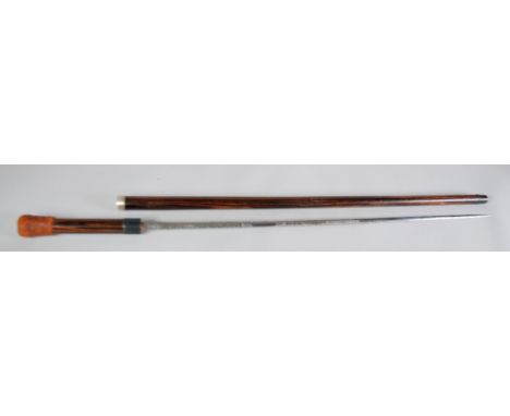 EARLY TWENTIETH CENTURY SWORD STICK, having coromandel case with electroplated ferrules and plaited tan leather knop to handl