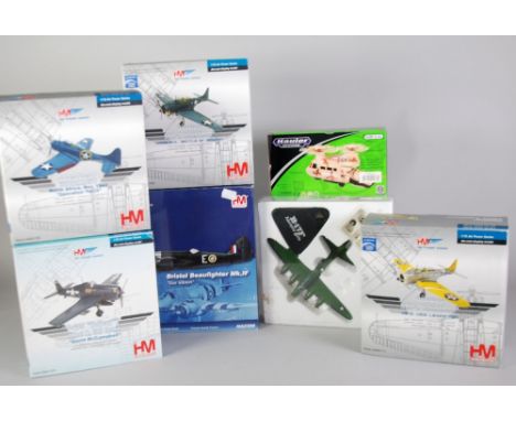 FOUR HOBBY MASTER (HM) MINT AND BOXED MODELS OF UNITED STATES WWII FIGHTER AIRCRAFT 1:72 scale, ANOTHER (possibly incomplete)