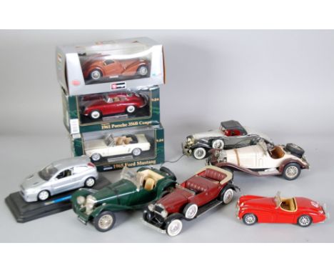 BURAGO MINT AND BOXED 1:24 SCALE MODEL OF A BUGATTI ATLANTIC 1936 two COLLECTIBLES DITTO OF 1965 Ford Mustang and 1961 Porsch