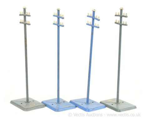 Hornby O Gauge a group of Telegraph Poles, two in light blue/grey and two in mid-blue.  Good. (4)