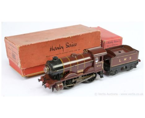 Hornby O Gauge E120 0-4-0 Loco and Tender LMS maroon No.8712, 20v electric.  Loco has fading to one side particularly to loco