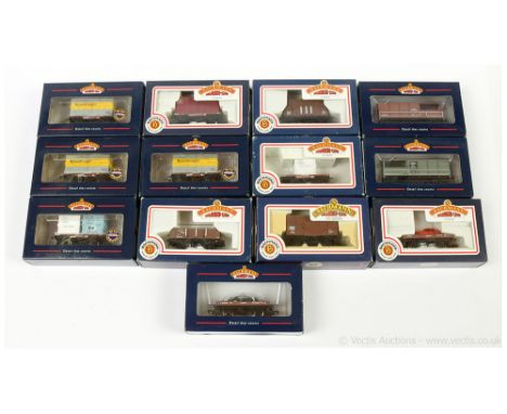 Bachmann OO Gauge Goods Wagons comprising 33-411 1-Plank with Ford Capri load, 33-412 1-Plank with Triumph TR3 load, 2 x Brak
