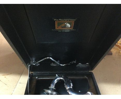 A HMV table top gramophone.