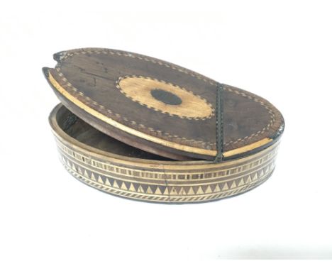 A 18th century George III oval snuff box with boxwood and satinwood inlay.
