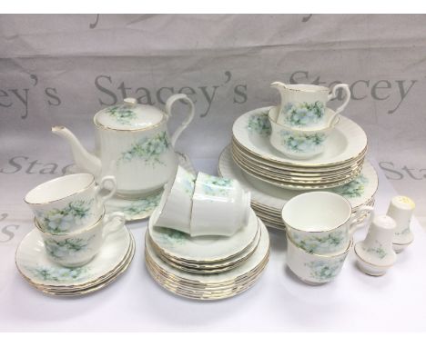 A Royal Stafford bone china tea and dinner set plus a Czechoslovakian tea set with floral spray decoration. Shipping category