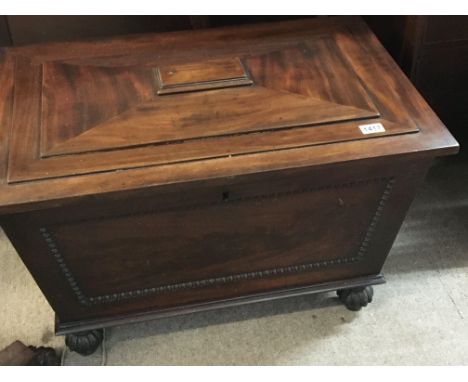 A William IV mahogany wine cooler with a stepped rectangular top the interior later fitted with a vintage Trio solid state St