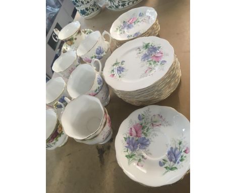 A Royal Albert bone china tea set Frendship sweet Pea pattern eight place setting with extra plates no obvious damage and Roy
