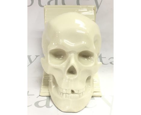A rare Hungarian Herend ceramic skull bookend, no obvious damage or restoration . This lot cannot be posted