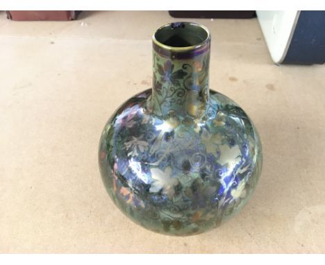 Richard Joyce Pilkington Royal Lancastrian luster vase with leaves. Hairline crack and chip to rim. 17cm tall.