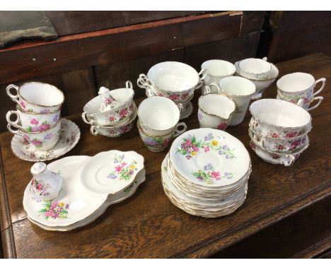 Tea sets Old Country Spray by Queen Anne, Carousel Royal Stafford including saucers, cups etc. this lot cannot be posted