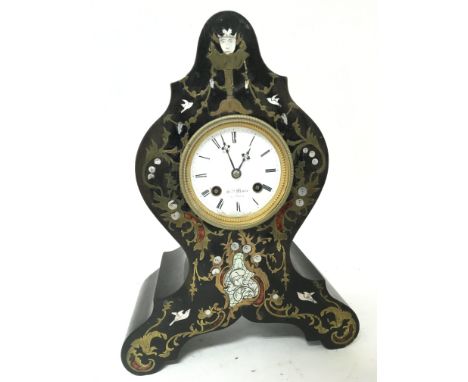 A late 19th Century French ebony veneered and brass inlaid with mother of pearl Mantel clock silk suspension movement strikin