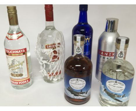 Two bottles of Wilkinson spirits Spitfire Vodka and Lancaster Spiced Rum and four other bottles of Vodka