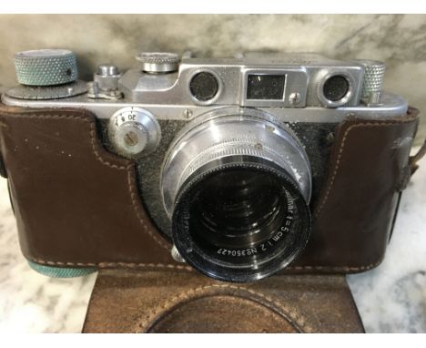 A Leica camera D.R .P No 282657  Summar lens 1.2 No 350427 .fitted in a leather case .