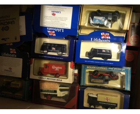 A box containing yesteryearâ€™s cars and a boxed Subbuteo.