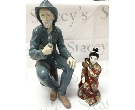 A large Nao porcelain Old Fisherman with a pipe figure and a 20th century Japanese Geisha figure. No obvious damage or restor