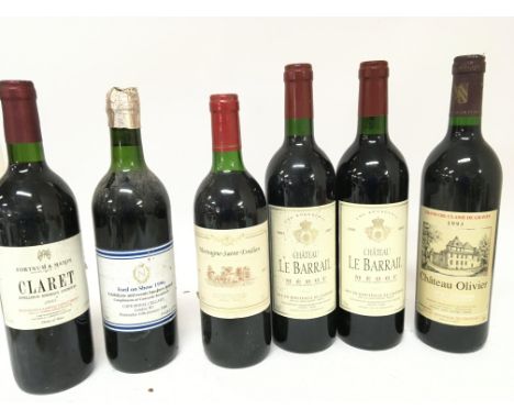 Six bottles of wine Chateau Le Barrail 2001 Medoc 1997 Montaigne Saint Emilion 1993 Chateau Oliver Grand Cru and other wine. 