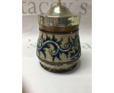 A Doulton Lambeth George tinworth preserve jar . With silver plated Lid and silver rim . 12 cm .