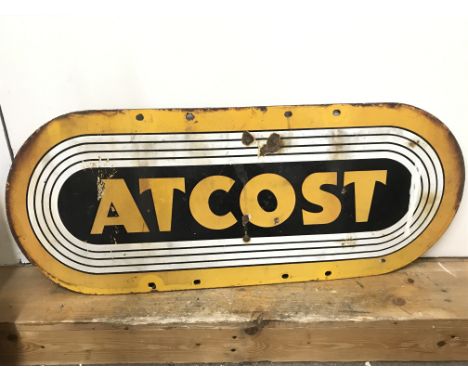 A vintage Atcost farm building enamel sign , 76cm long, 30cm tall