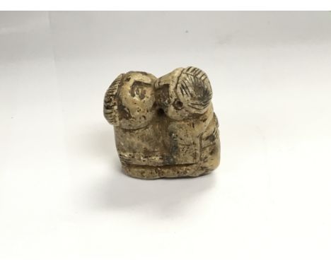 A hand carved stone amulet. NO RESERVE
