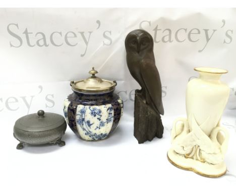 A collection of items including a Cold cast owl figure, ceramic biscuit barrel, swan vase , pewter pot, 1914 shell case trenc