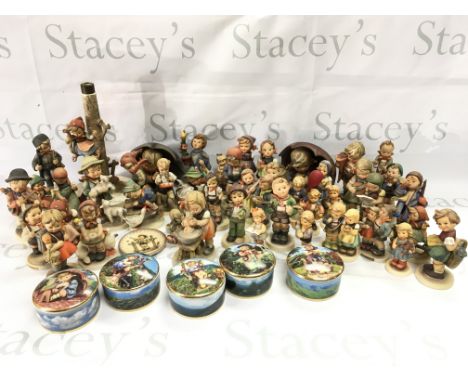 A large collection of porcelain Hummel figures and some Danbury Mint Hummel music boxes. This lot cannot be posted