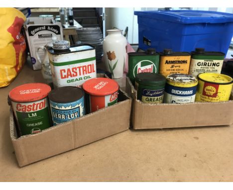 A Collection of vintage motoring grease tins including Duckhams , Shell, Castrol etc. postage category B