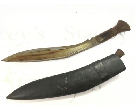 A Kukri knife , blade 32cm long . Total length 45cm