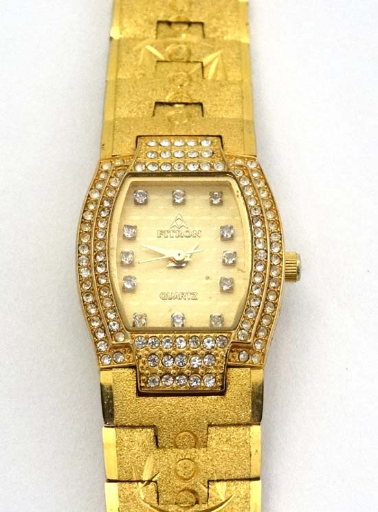 Fitron 22 carat gold plated ladies watch : a Tonneau shaped case with ...