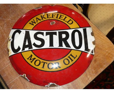 A convex enamel advertising sign for Castrol motor oil, dia.30cm