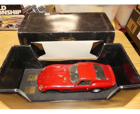 A Revell 1/12 scale model of a 1964 Ferrari 250 GTO housed in the original boxFront wheel detached. Parts missing. Box very s