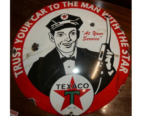 An enamel convex advertising sign for Texaco, dia.30cm