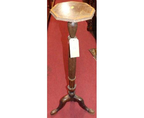 An early 20th century mahogany fluted plant stand with octagonal top, height 109cm