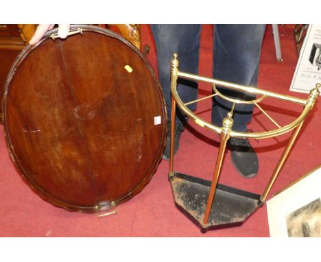 A 19th century mahogany oval twin handled drinks tray, together with a tubular brass demi-lune four division stick stand (2)