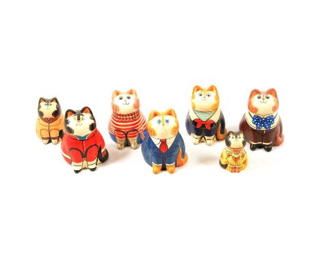 Collection of seven De Bethel Rye Pottery style cats, five large 11.5cm high, and two smaller, all unmarked.Qty: 7