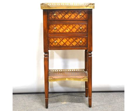 French parquetry side table, the top with three quarter brass gallery, three drawers above an open shelf, width 38cm, depth 3