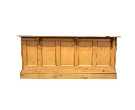 Haberdashery unit.Provenance:Mahogany and pine habadashery counter, rectangular mahogany top with inset brass measure, the ba