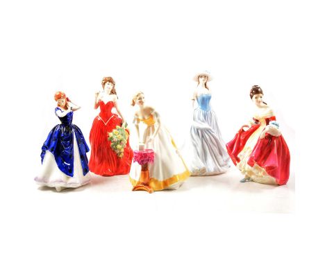 Nine large sized Royal Doulton figurines, including Happy Birthday HN3095, Alexandra HN3206, and others, along with a Royal W