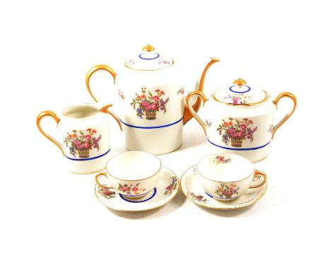 Limoges porcelain tea service, comprising tea pot, sucrier, milk jug, eight cups and eleven saucers, transfer decoration of f