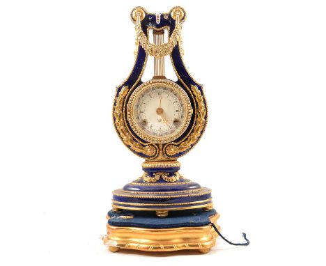 Modern 'Marie Antoinette' porcelain mantel clock, for the V&amp;A, damages, overall height 37.5cm.